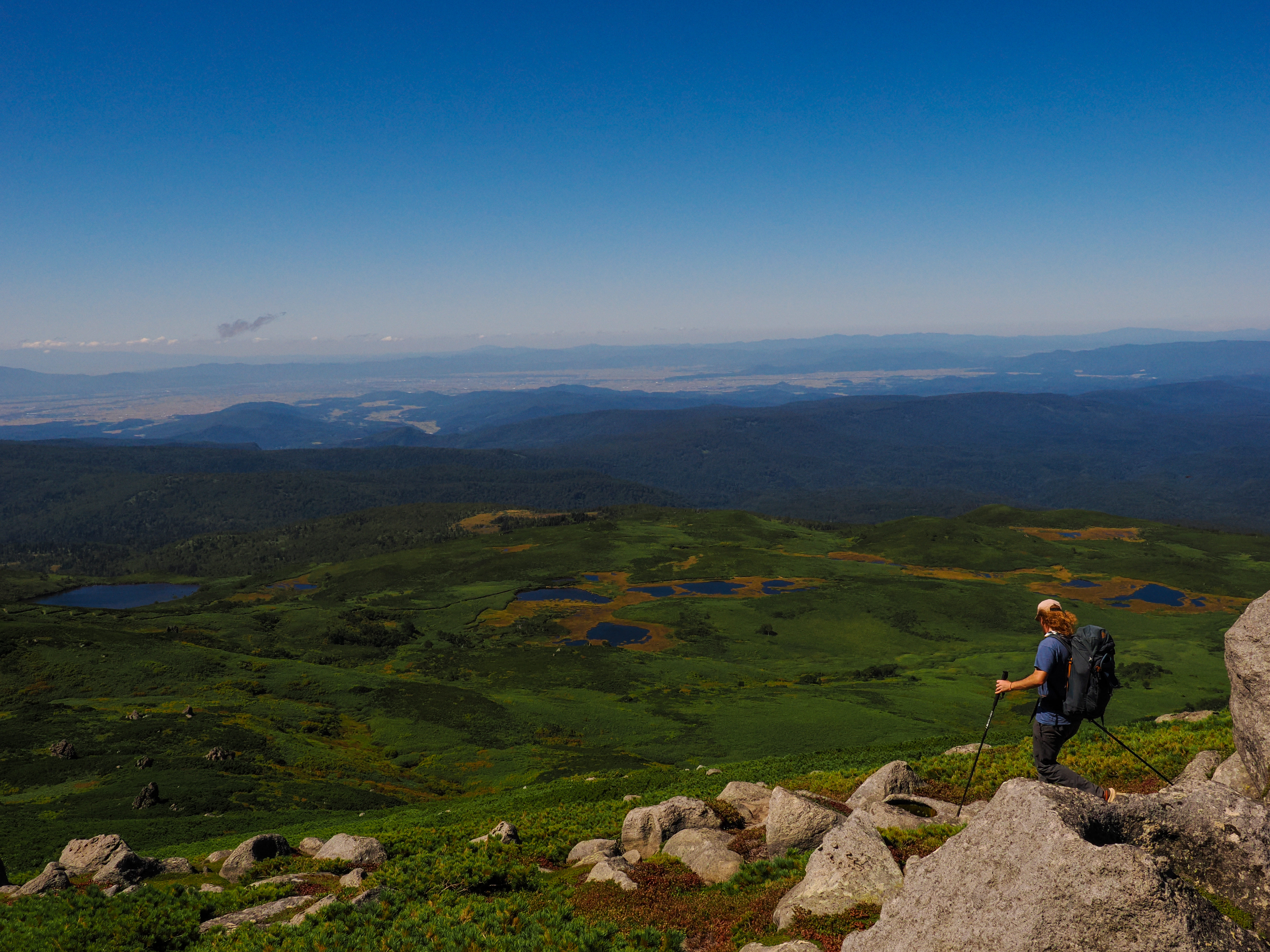 beautiful scenic view of a hiker in numanodaira, daisetsu san